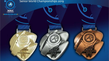 Фотография к новости: Күрестен әлем чемпионына берілетін медальдар таныстырылды