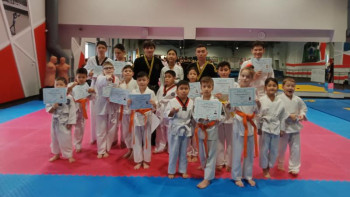 Фотография к новости: Мүмкіндігі шектеулі балалар таеквондодан белбеу қорғады