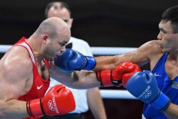 Фотография к новости: Токио-2020: Қазақтандық бокс бастағы шлем шешілгеннен кейін өзгерді ме?