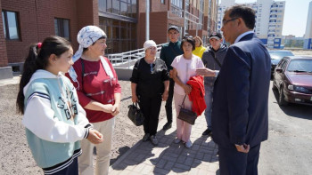 Фотография к новости: Өрт салдарынан қаза тапқан 14 адамның отбасына пәтер кілттері табысталды