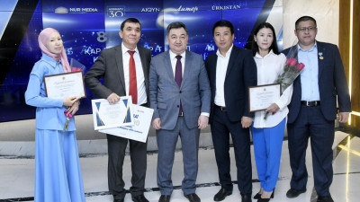 Ақпарат министрі Astana TV және «Айқын-литер» ЖШС ұжымымен кездесті