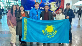 Фотография к новости: Самбодан әлем кубогының жүлдегері Әлібек Зекенов елге оралды