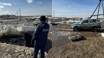 Фотография к новости: Учаскелік полицей үйлерін су басқан тұрғындарды құтқарды