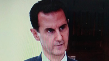 Фотография к новости: Башар Асад отбасымен бірге Мәскеуге келді – ТАСС