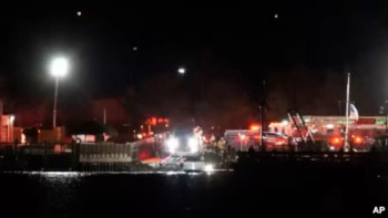 Фотография к новости: Вашингтонда ұшақ пен тікұшақ соқтығысып, өзенге құлады