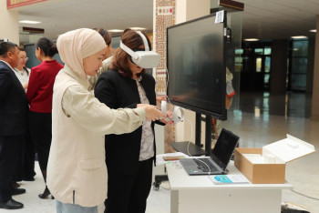 Фотография к новости: Астанада ЕҰУ зерттеушілері ЖИ жобаларын таныстырды