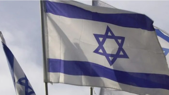 Фотография к новости: ӘЧ–2026 іріктеу матчы алдында Норвегияда Израиль туы өртенді