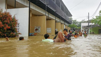 Фотография к новости: Индонезиядағы су тасқыны мен лай көшкінінен қаза тапқандар саны 442-ге жетті