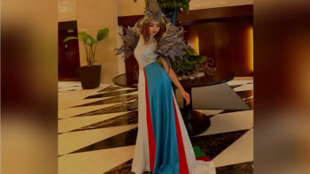 Фотография к новости: Өзбекстанның ұлттық туының түстеріндегі көйлек үшін модельге айыппұл салынды